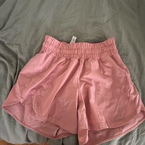 Lululemon track that shorts. Pink, size 4